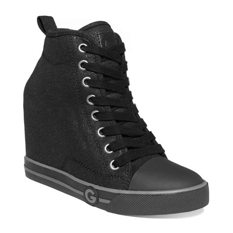 black wedge high top sneakers.